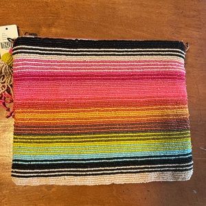 Multicolored stripped beaded zip clutch. So stylish